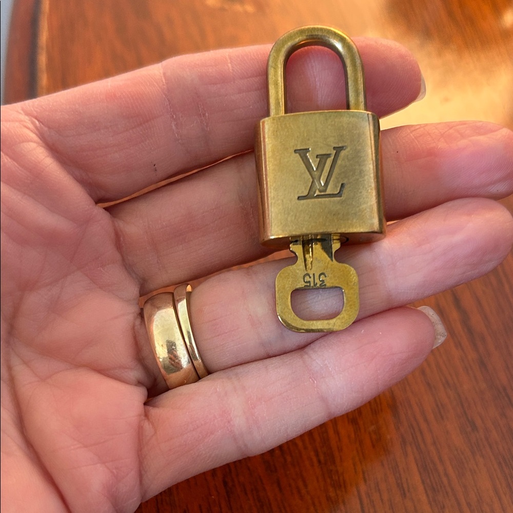 #315 Louis Vuitton Gold Padlock with Key
